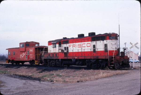 GP7 620 and caboose 1442 at Columbus, Kansas in March 1979