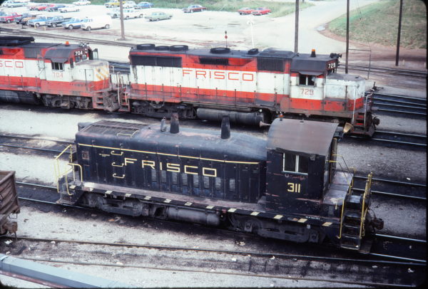 SW9 311 and GP35 729 (probably at) Springfield, Missouri in August 1977