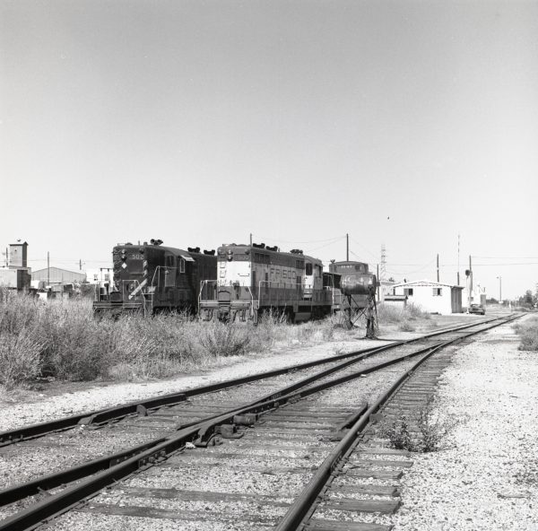 GP7s 502 and 500, and Caboose 1147 at Clinton, Oklahoma on September 30, 1972