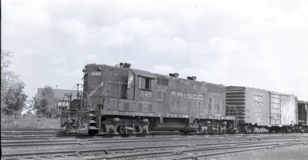 GP7 548 and Boxcar 27179 at North Clinton, Missouri on May 12, 1975