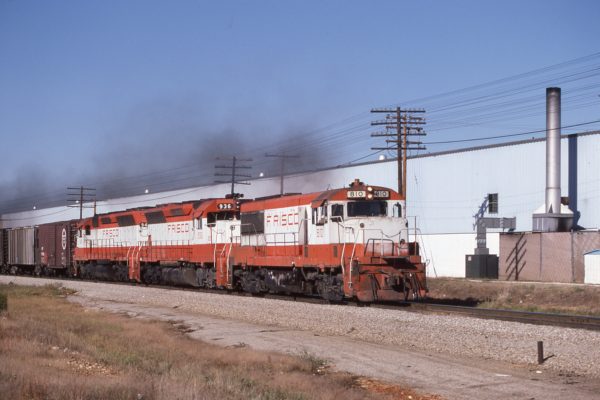 U25B 810, and SD45s 936 and 945 at Teed, Missouri on October 17, 1980