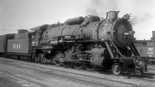 2-8-2 4144 and Caboose 364 at Tulsa, Oklahoma on August 9, 1947 (Eldridge)