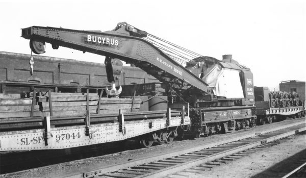 Flatcar 97044 and Steam Wrecker 99024 at Springfield, Missouri on November 11, 1948 (Arthur B. Johnson)