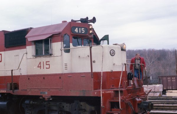 GP38-2 415 and Engineer J.C. Caldwell at Thayer, Missouri on December 28, 1978 (R.R. Taylor)