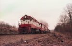 GP38-2 432, U30B 840, B30-7 869, U25B 831, B30-7 865 and Boxcar 47220 North of Thayer, Missouri on December 31, 1979