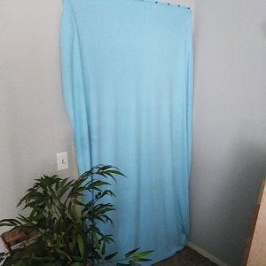 Curtain over closet opening